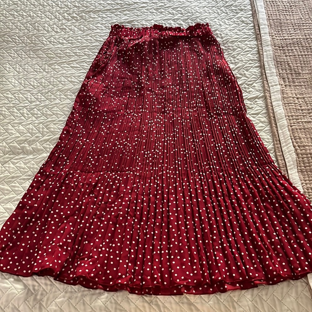 Red pleated skirt
